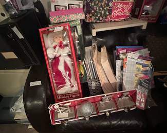 Mire Christmas items in leather recliner 