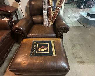 Leather chair with matching ottoman - small rugs 