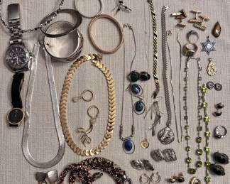 Jewelry: fine jewelry of gold and sterling, artisan jewelry and costume pieces.