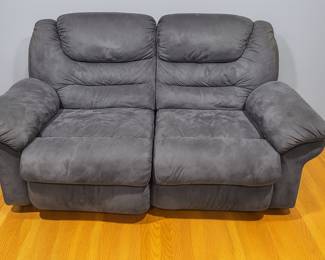 Blue reclining loveseat