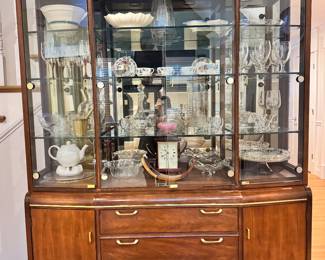 Thomasville china cabinet with 4 drawers and additional storage.