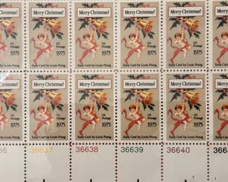 A notable collection of stamps. This is an example of the many unused, uncirculated, protected sheets of US postage stamps of all styles and years.