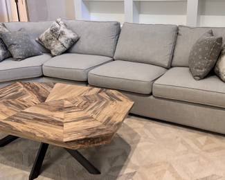 Gray sectional sofa by Arhaus