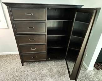 5 drawer Gentleman's chest with mirror and shelves inside.