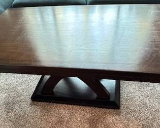 Dark wood rectangular coffee table.
