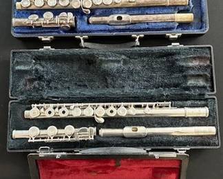 Armstrong Model 104 student flute, silver plated open-hole concert flute and Yamaha Professional Piccolo.