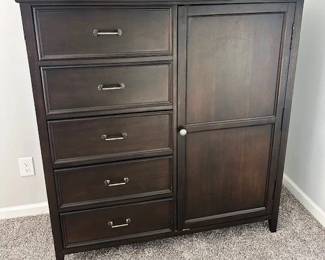 5 drawer Gentleman's chest with mirror and shelves inside.