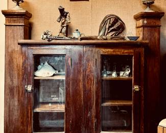 Victorian cabinet with built-in light fixtures