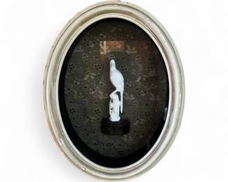 Carved framed Asian figure 