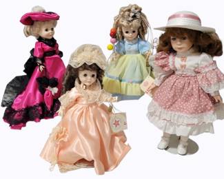 122 - 4 Assorted Porcelain Royal Dolls
