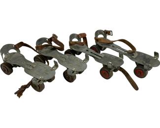 2363 - 4 Vintage Roller Skates 9"
