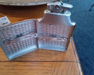 Lighter and cigarette holder