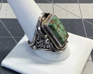 VTG ROYSTON TURQOISE RING THIS STERLING SILVER RING FEATURES WONDER TURQUOISE STAMPED E, WEIGHT IS 12.88 GRAMS AND SIZE 11