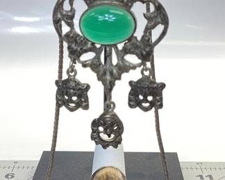 ANTIQUE SILVER JEWELRY LOT EARLY 20TH CENTURY COMMEDIA DELL'ARTE RENAISSANCE REVIVAL PENDANT (POSSIBLE PERUZZI OR COPPINI DESIGNED) SET IN 800(80%) SILVER FEATURING A CABOCHON CHRYSOPRASE. THE ANTIQUE PIECE IS HUNG FROM A 24 INCH STERLING BOX LINK CHAIN. WEIGHT 26.56 GRAMS. ALSO AN ANTIQUE STERLING SCRIMSHAW RING WITH LIONS HEAD ETCHING. WEIGHT IS 9.42 GRAMS, SIZE 6.5. RING HAS SIGNS OF AGE AROUND THE OUTER DIAMETER. PATINA HAS BEEN KEPT TO PRESERVE THESE PIECES