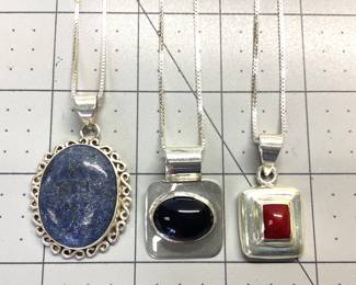 3 STERLING CHAINS AND GEMSTONES THIS LOT FEATURES 3 STERLING SILVER 20 INCH BOX LINK CHAINS WITH BEAUTIFUL GEMSTONES SET IN STERLING. WE HAVE 3 CABOCHON STONES LAPIS, RED JASPER, AND ONYX. TOTAL WEIGHT IS 38.66 GRAMS