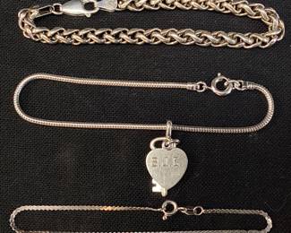 (3) STERLING SILVER CHAIN BRACELETS 1 WITH HEART CHARM MARKED B.J.E., 21.15g TOTAL WEIGHT