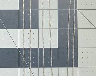 3 STERLING CHAINS AND GEMSTONES THIS LOT FEATURES 3 STERLING SILVER 20 INCH BOX LINK CHAINS WITH BEAUTIFUL GEMSTONES SET IN STERLING. WE HAVE 3 CABOCHON STONES LAPIS, RED JASPER, AND ONYX. TOTAL WEIGHT IS 38.66 GRAMS