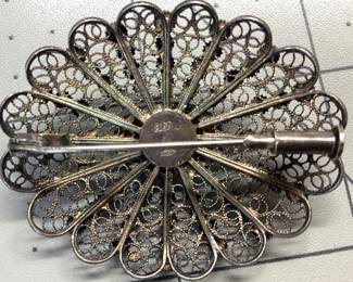 VTG ART NOUVEAU SILVER, RED CORAL BROOCH STAMPED 800 (80%) SILVER ANTIQUE FILIGREE BROOCH FEATURES CABOCHON RED CORAL. WEIGHT IS 9.86 GRAMS. PATINA IS LEFT TO PRESERVE PIECE.