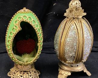 (2) HAND CRAFTED FABERGE STYLE DUCK EGGS ADORNED WITH GOLD COLORED TRIM ON STANDS