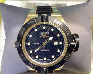 INVICTA LIMITED ED. 6534 WATCH THIS LIMITED EDITION PROJECT ABDA SUBAQUA NOMA IV SERIES FEATURES BRUSHED GOLD AND BLACK ACCENTS AUTOMATIC SWISS MOVEMENT, DATE WINDOW, CUSTOM BEZEL, AND CROWN CAP. BOX INCLUDED.