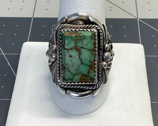 VTG ROYSTON TURQOISE RING THIS STERLING SILVER RING FEATURES WONDER TURQUOISE STAMPED E, WEIGHT IS 12.88 GRAMS AND SIZE 11