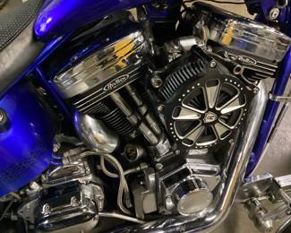 2021 HARLEY DAVIDSON VIN: 4EMEW2E3YN151010 Color: BLUE 2021 CUSTOM HARLEY DAVIDSON w REVTECH 6 SPEED TRANSMISSION, ENGINE CODE 58505 with 6 SPEED HIGHWAY TRANSMISSION, CUSTOM BLUE PAINT, AFTER MARKET GRIPS, CUSTOM RIMS, FREEDOM PERFORMANCE PIPES,