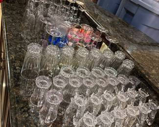 Tea cups, glasses, martini glasses, wine glasses - all different available. Each row is the same type of glass 