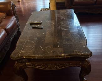 Cocktail table with marble top