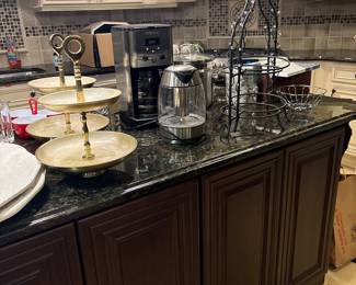 Coffee maker, electric teapot, liquor, decanter, pots, ice, bucket, cutlery holder, paper towel, holder, plate holder, two-tier stand, lots of platters, serving items