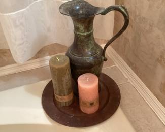 decorative pitcher with round metal tray