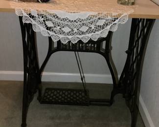 singer treadle sewing machine base with added wooden top