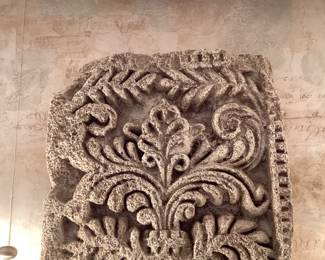 stone scroll work wall decor