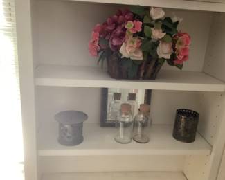 corked jars and candle holders