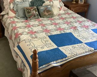 hand stitched double wedding ring patterned quilt