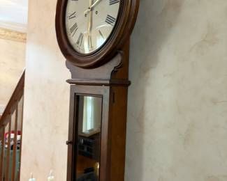 barwick hanging clock by howard miller. Runs 