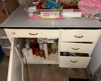 Wood utility table to enameled top - $45.   Filled with candles $1 each for candles! 