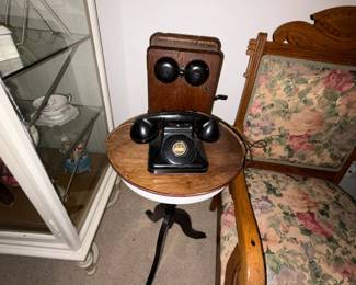 Antique phone and box. Small round table. 
