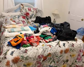 Small dog outfits and dog carriers. Wicker bed frame and full mattress - make an offer!  