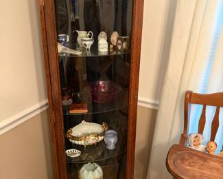 Corner cabinet. Shows well. Small crack in glass on lower corner. $190 