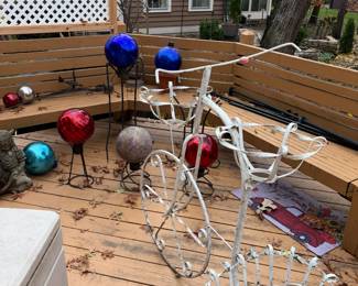 Many large outdoor and garden items - check out the side porch! Metal decorative garden bike - $75