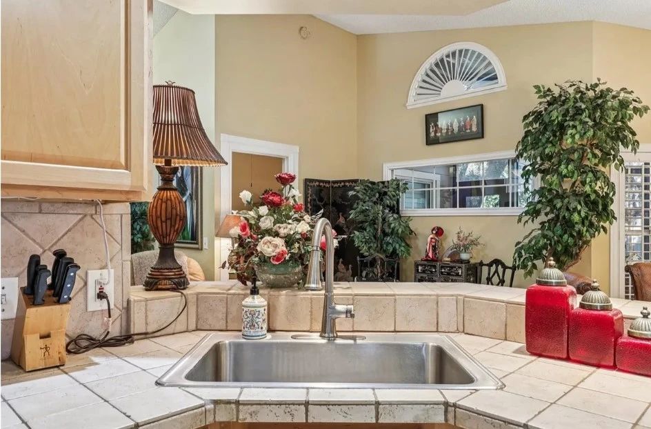 Kitchen looking to living room