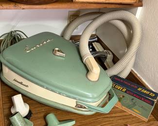 1955 Eureka Roto-Matic vacuum system with attachments