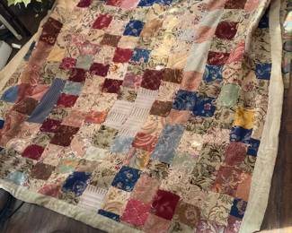 Nice vintage quilt (sunlight coming through the window creates the spots).