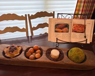 rustic dough bowl with decor and cookbook with stand