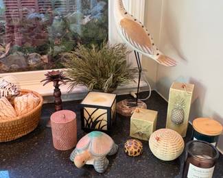 assorted candles and bird