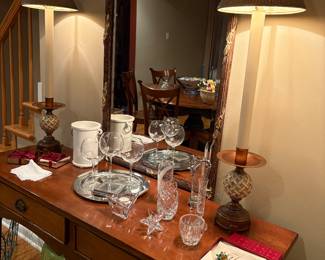 Console entryway table with 2 drawers by Baker, mirror, buffet lamps (2), and drum tables (2), crystal vases, ceramic wine cooler, and Neiman Marcus martini scewers (in box)