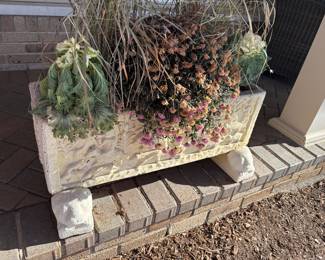 Cement planter with lion brackets