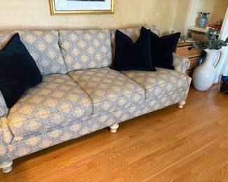 3 cushion couch by Harden and shown with navy blue velvet accent pillows