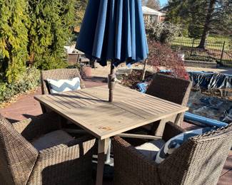 Outdoor square patio table with 4 armchairs, umbrella and stand