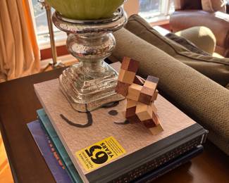 Mercury glass pillar holder, books and wood games